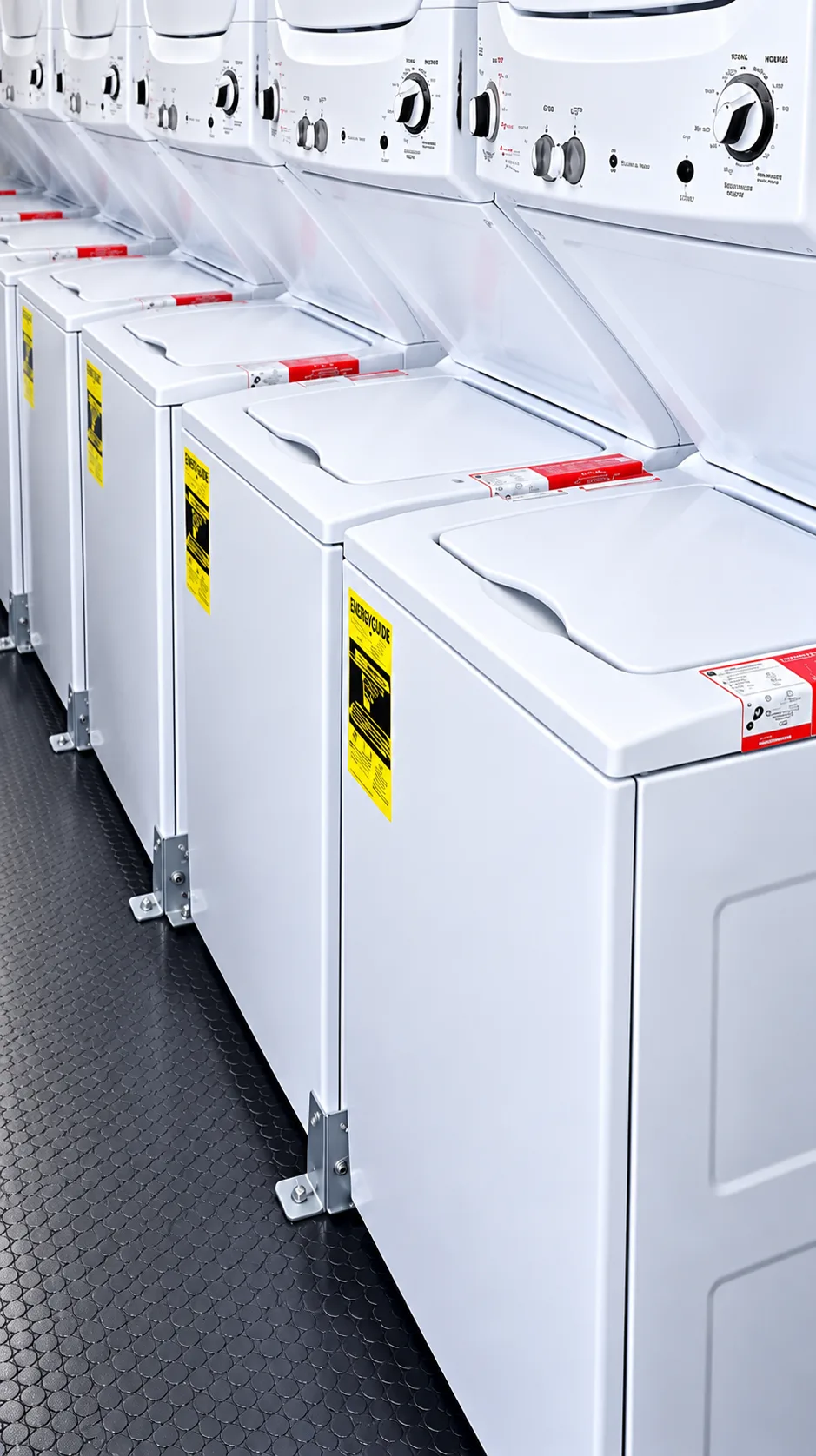 Commercial washers and dryers installed inside a mobile laundry trailer
